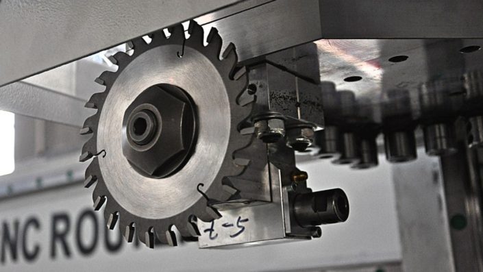 saw 705x397 - ACP Panel CNC Cutting